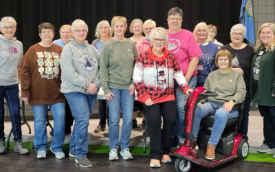 Volunteers Fill Fruit Baskets